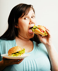 Image showing fat white woman having choice between hamburger and salad