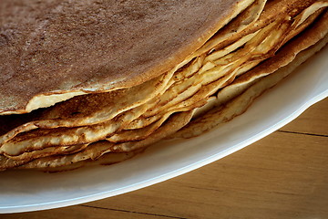 Image showing  stack of pancakes roasting it