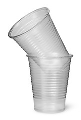 Image showing Two plastic cups each other