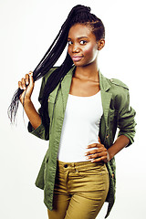 Image showing young pretty african-american girl posing cheerful emotional on white background isolated, lifestyle people concept