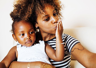 Image showing adorable sweet young afro-american mother with cute little daugh