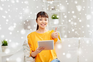 Image showing happy asian woman with tablet pc and thumbs up