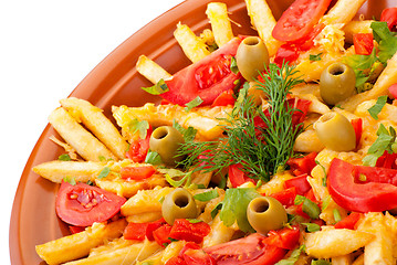 Image showing golden French fries potatoes with tomato and olive