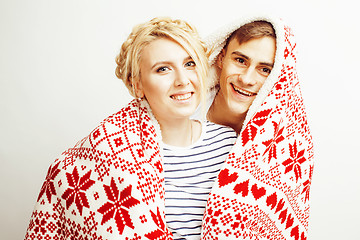 Image showing young pretty teenage couple, hipster guy with his girlfriend happy smiling and hugging isolated on white background, lifestyle people concept, valentine design winter plaid