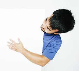 Image showing pretty cool asian man holding empty white plate smiling