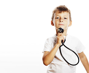 Image showing little cute boy with stethoscope playing like adult profession d