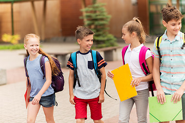 Image showing group of happy elementary school students walking