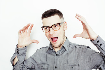 Image showing young handsome well-groomed guy posing emotional on white background, lifestyle people concept