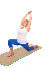 Image showing Yoga trainer showing some stretching.