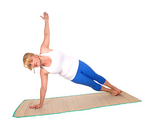 Image showing Yoga trainer showing exercise poses.