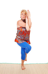 Image showing Yoga trainer in some poses.