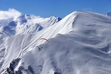 Image showing Speed flying in snow winter mountains