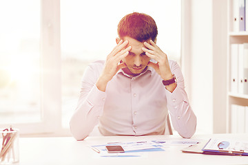 Image showing close up of businessman with smartphone