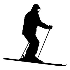 Image showing Mountain skier speeding down slope. sport silhouette