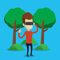 Image showing Man wearing virtual reality headset in the park.