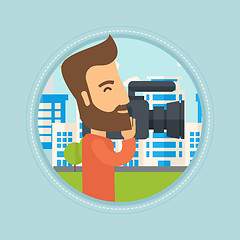 Image showing Cameraman with video camera vector illustration.