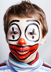 Image showing little cute boy with facepaint like clown, pantomimic expression