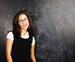 Image showing portrait of happy cute student in classroom at blackboard back to school, crazy emotional, lifestyle people concept