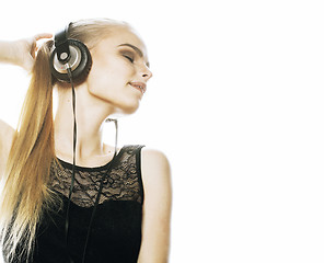 Image showing young sweet talented teenage girl in headphones singing isolated