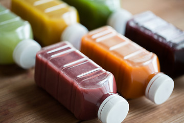 Image showing bottles with different fruit or vegetable juices