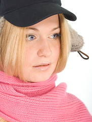 Image showing blue-eyed blonde in fur cap and  pink scarf