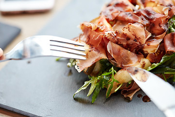 Image showing close up of prosciutto ham salad at restaurant