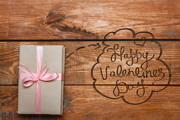 Image showing Valentines Day gift   on wooden background
