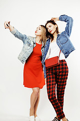 Image showing best friends teenage girls together having fun, posing emotional on white background, besties happy smiling, lifestyle people concept