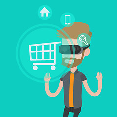 Image showing Man in virtual reality headset shopping online.