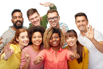 Image showing international group of people showing thumbs up