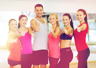 Image showing group of people in the gym showing thumbs up