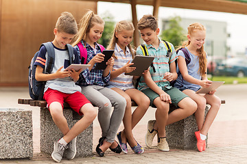 Image showing group of happy elementary school students talking