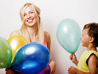 Image showing pretty real family with color balloons on white background, blon