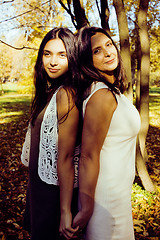 Image showing mature real mother with daughter outside autumn fall in park