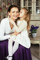 Image showing young mother with daughter at luxury home interior vintage