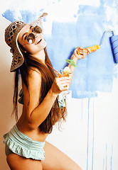 Image showing cute bright woman in sunglasses and hat with cocktail in bikini 