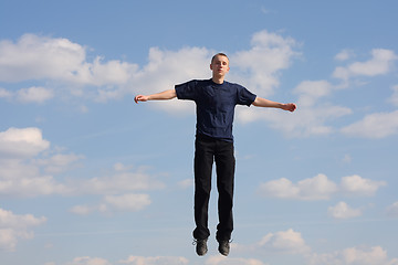 Image showing Jumping teenage boy