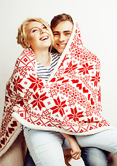 Image showing young pretty teenage couple, hipster guy with his girlfriend happy smiling and hugging isolated on white background, lifestyle people concept, valentine design winter plaid