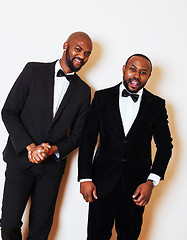 Image showing two afro-american businessmen in black suits emotional posing, g