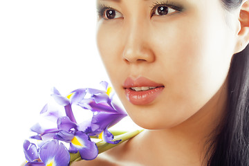 Image showing young pretty asian woman with flower orchid close up isolated spa