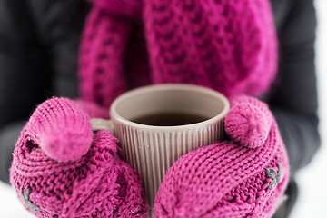 Image showing close up of woman with tea mug outdoors in winter