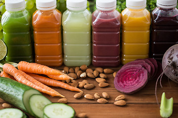 Image showing bottles with different fruit or vegetable juices