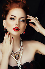 Image showing beauty stylish redhead woman with hairstyle and manicure wearing jewelry pearl close up