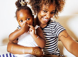 Image showing adorable sweet young afro-american mother with cute little daugh