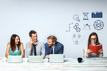 Image showing Business team working on their  project together at office