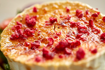 Image showing close up of goat cheese salad with dried berries