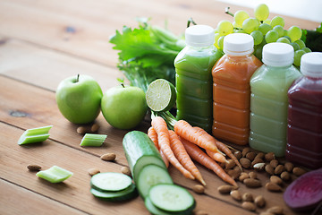 Image showing bottles with different fruit or vegetable juices