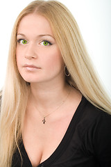 Image showing green-eyed woman in black