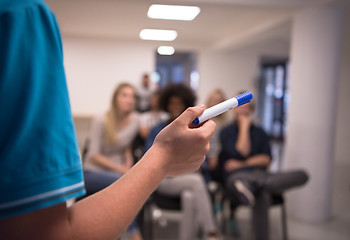 Image showing close up of teacher hand with marker