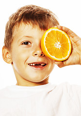 Image showing little cute boy with orange fruit double isolated on white smili